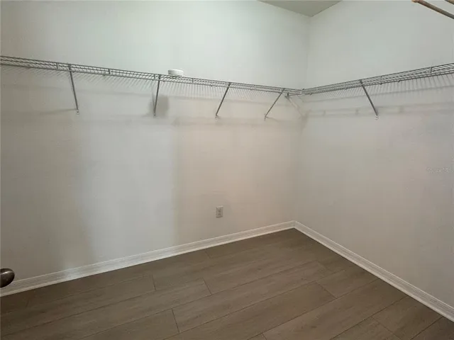 a view of a room with racks on the wall