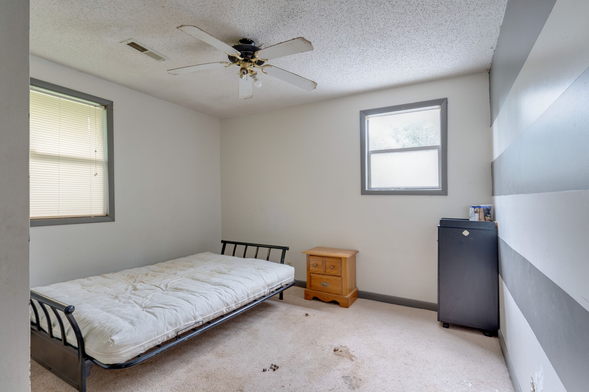 4594 Chestnut Ridge Road Columbia, TN 38401 - Photo 19 of 25 a bedroom with a bed and a chandelier