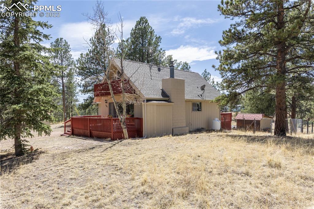442 Due S Road Florissant, CO 80816 - Photo 2 of 43 a view of a house with a yard covered in snow