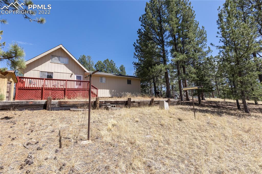 442 Due S Road Florissant, CO 80816 - Photo 38 of 43 a view of a backyard with a tree