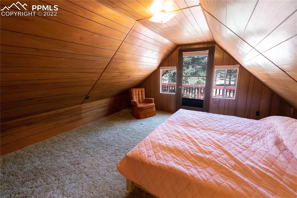 442 Due S Road Florissant, CO 80816 - Photo 8 of 43 a bed sitting in a spacious bedroom next to a window