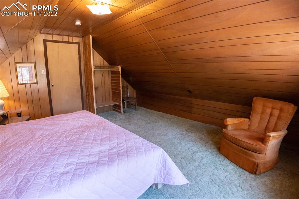 442 Due S Road Florissant, CO 80816 - Photo 10 of 43 a bedroom with a bed and furniture