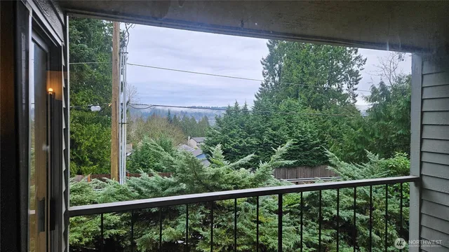 a view of a balcony with an outdoor space
