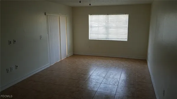 an empty room with a window