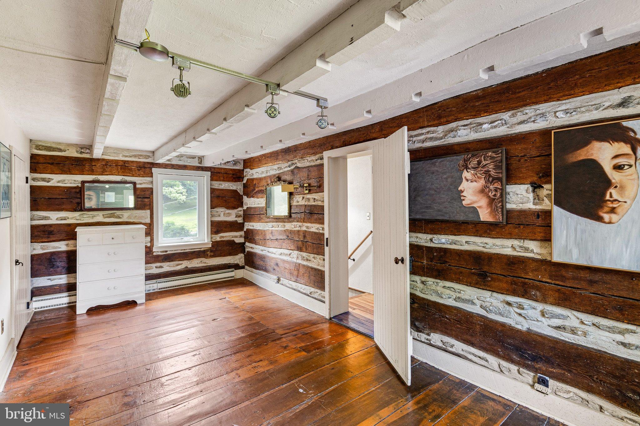 384 Blacksnake Road Elkton, MD 21921 - Photo 18 of 39 Bedroom 2 with cabin walls