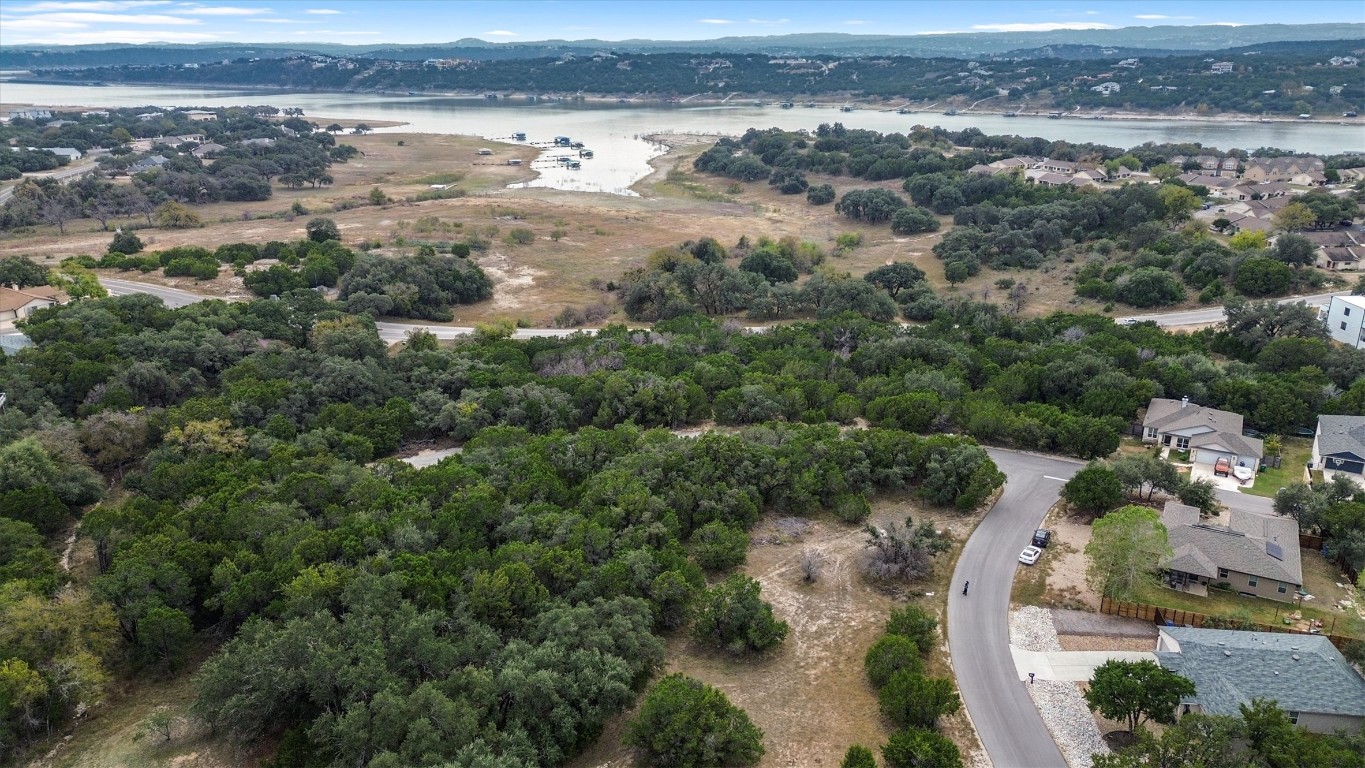 21002 Santa Rosa Avenue Lago Vista, TX 78645 - Photo 2 of 8 an aerial view of beach and residential houses with outdoor space