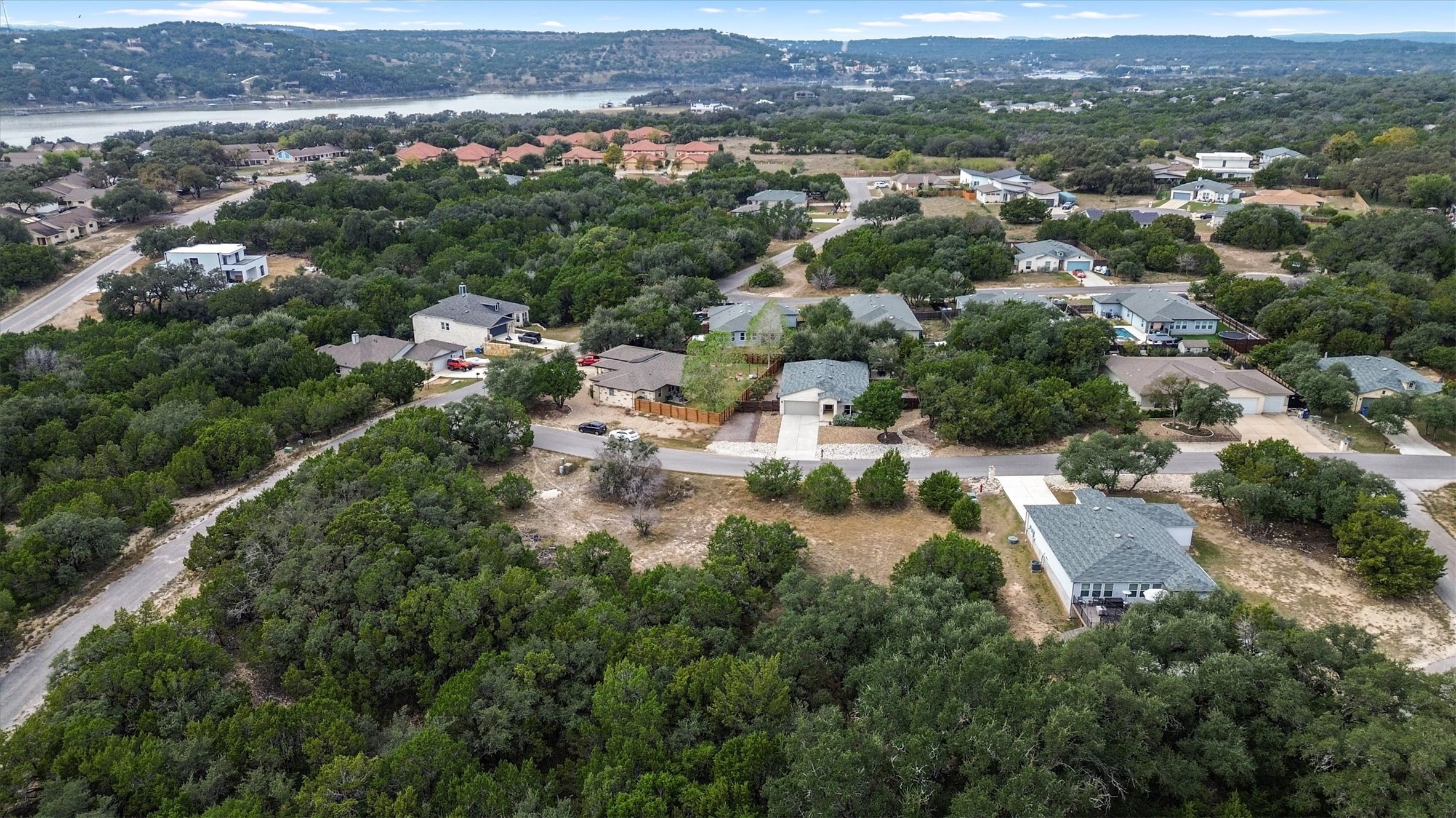 21002 Santa Rosa Avenue Lago Vista, TX 78645 - Photo 3 of 8 an aerial view of multiple house
