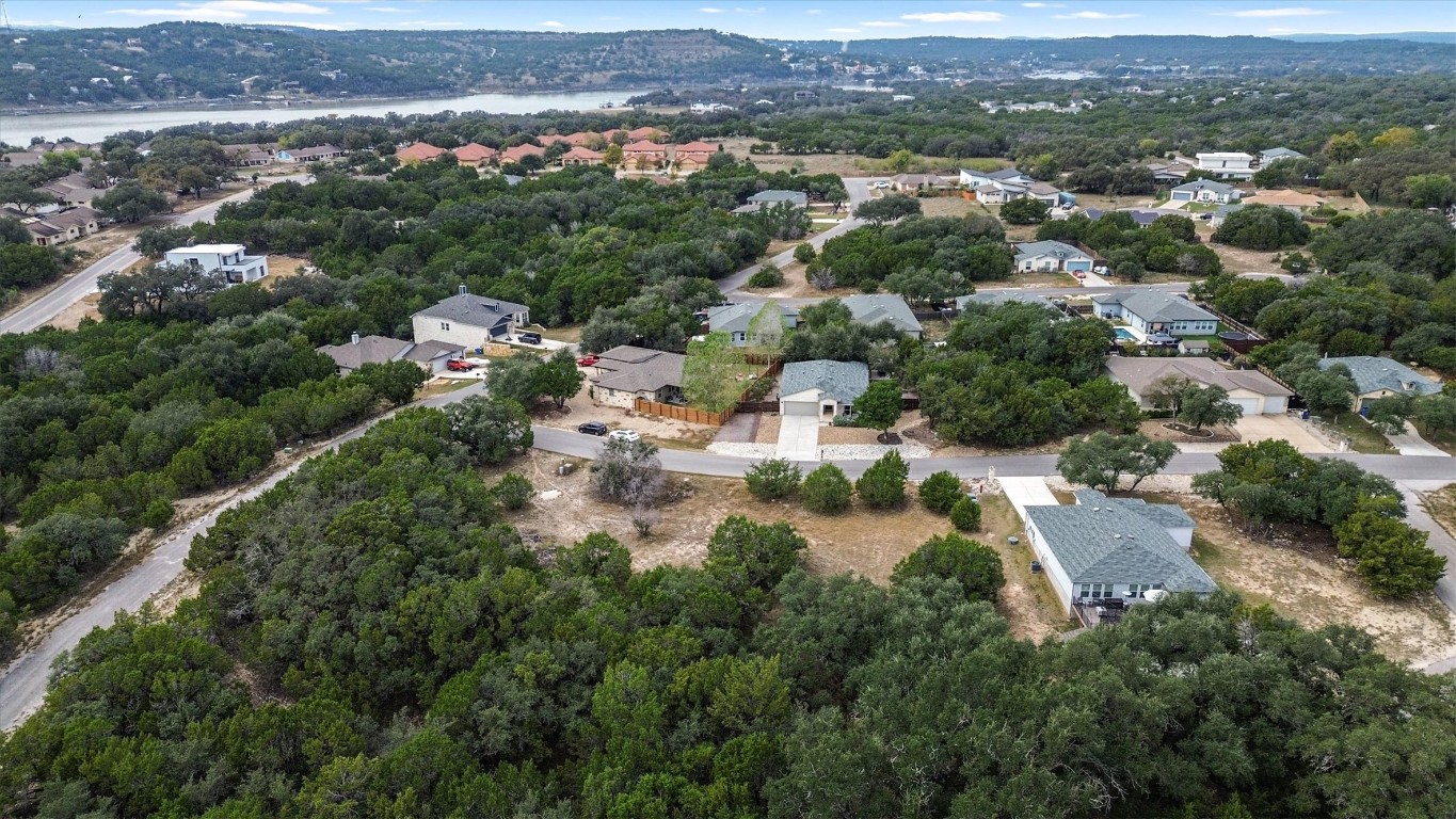 21002 Santa Rosa Avenue Lago Vista, TX 78645 - Photo 3 of 8 an aerial view of residential houses with outdoor space and trees