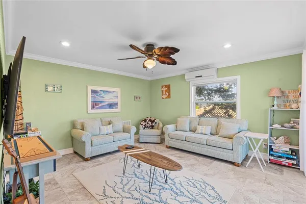 a living room with furniture and a couch