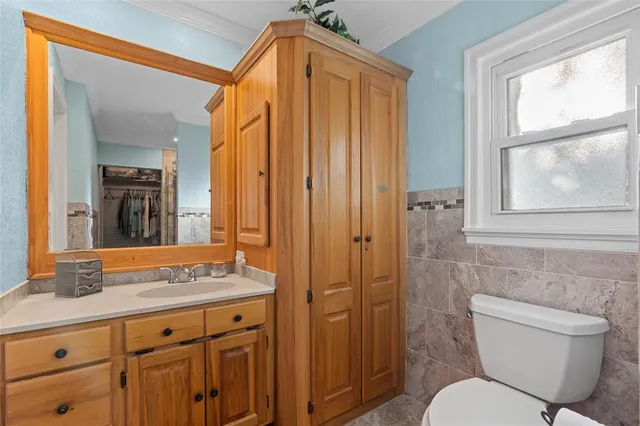 a view of a chairs and table in patio