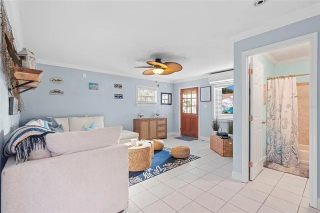 a living room with furniture and a table