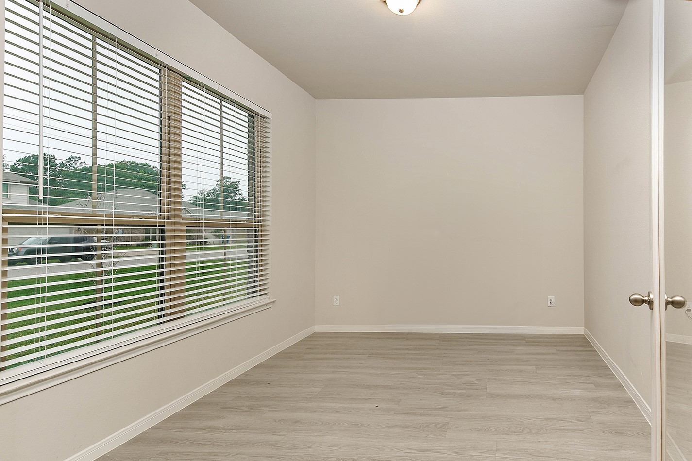 26324 Cooperstown Way Splendora, TX 77372 - Photo 5 of 23 a view of a room that has a window in it