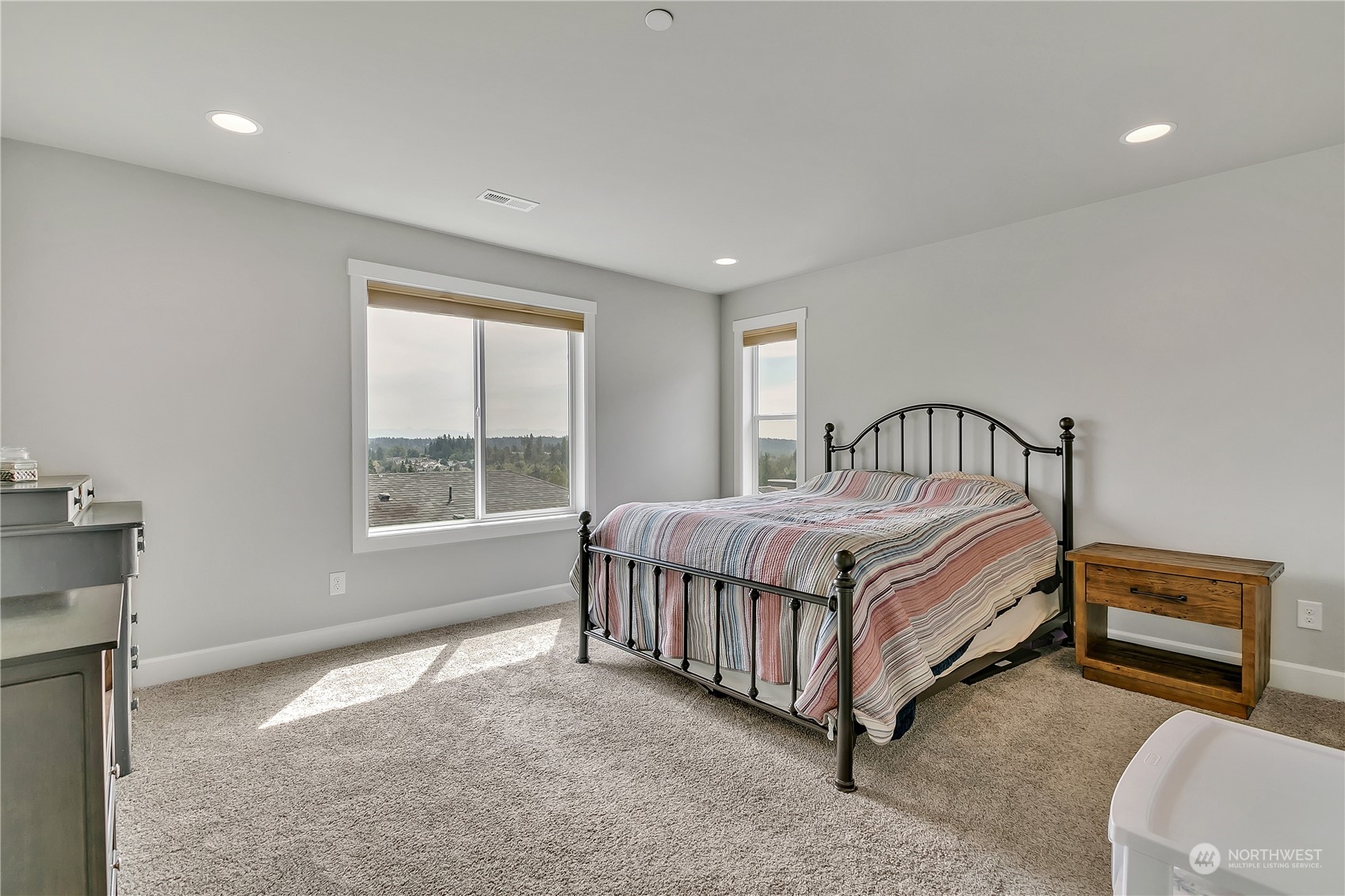 18103 Baldwin Road Bothell, WA 98012 - Photo 18 of 39 a bed sitting in a room next to a window