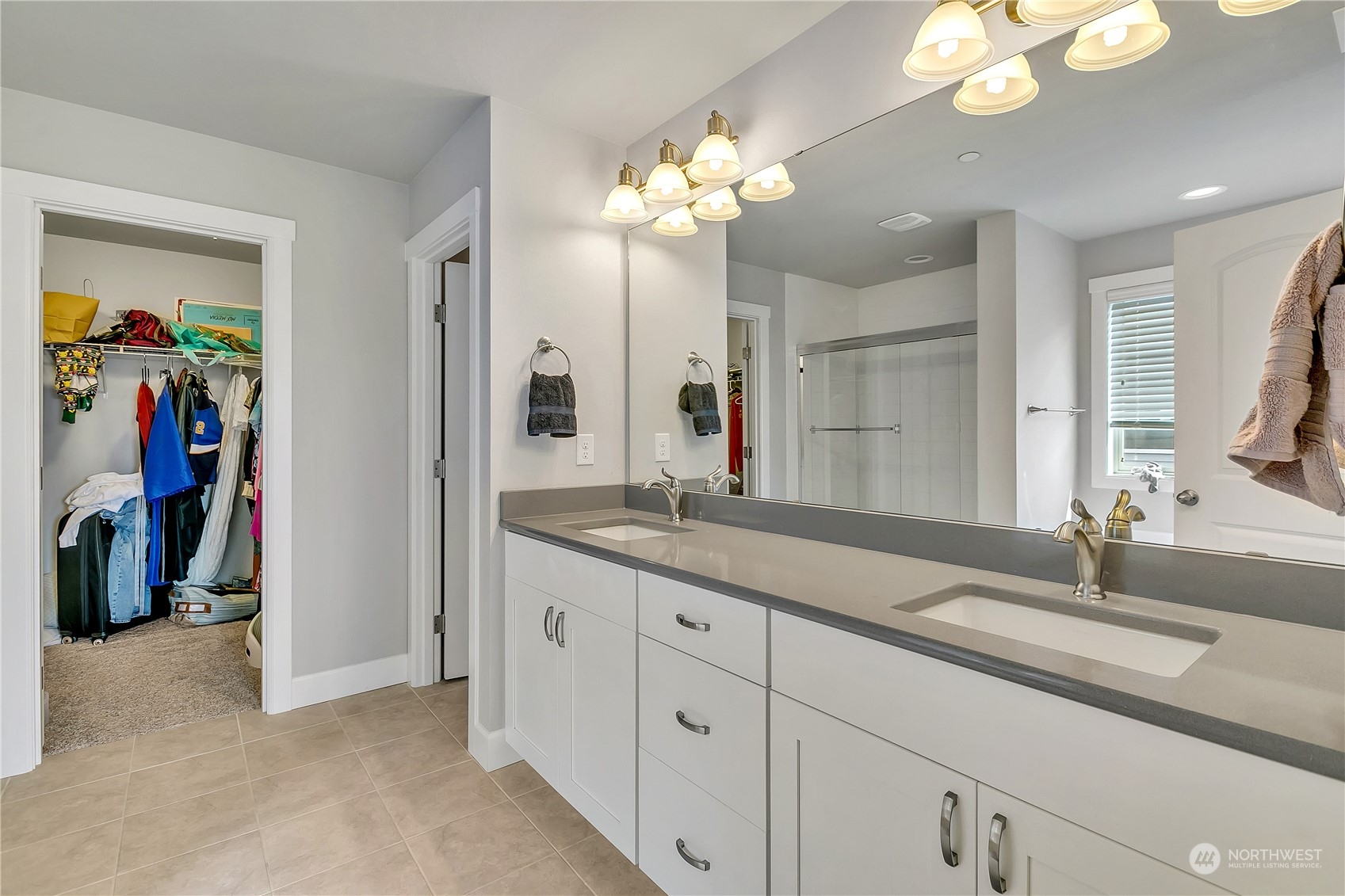 18103 Baldwin Road Bothell, WA 98012 - Photo 20 of 39 a bathroom with a double vanity sink and a mirror
