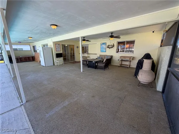 a view of livingroom with furniture and windows