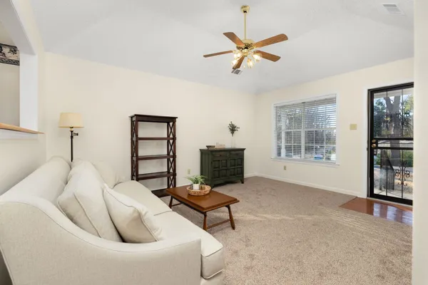 a kitchen with stainless steel appliances granite countertop a stove a sink dishwasher and a refrigerator