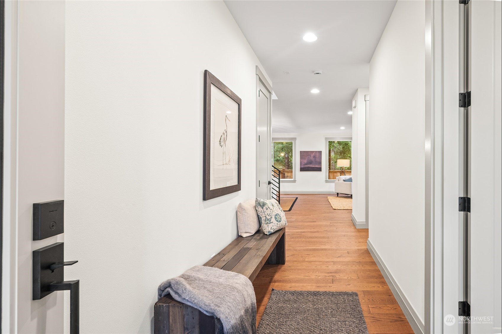 317 174th Street Southeast Bothell, WA 98012 - Photo 3 of 37 a view of a hallway with furniture and windows