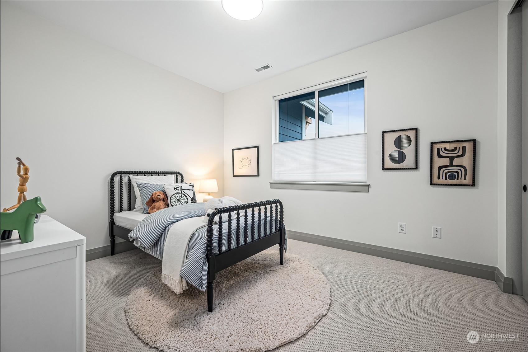 317 174th Street Southeast Bothell, WA 98012 - Photo 31 of 37 a room with two beds and a window