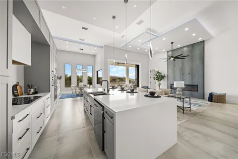 an aerial view of multiple houses with yard