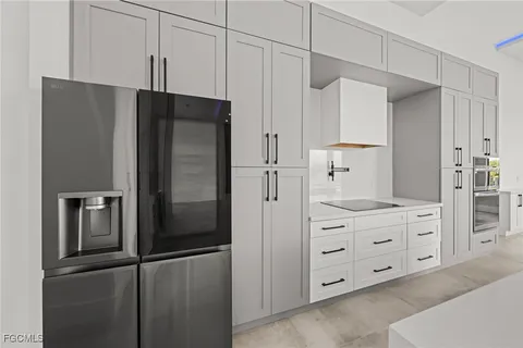 a spacious bathroom with a double vanity sink mirror double and shower