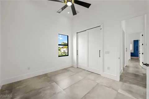 a bathroom with a toilet a sink and shower