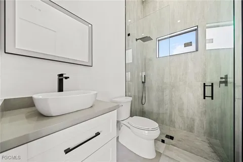 a view of an entryway and a fan