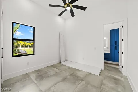 a bathroom with a toilet a sink and shower
