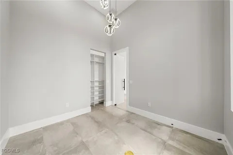 a kitchen with a sink stove and refrigerator