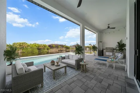 a outdoor living space with furniture and city view