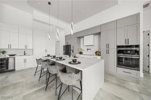 a view of swimming pool with outdoor seating