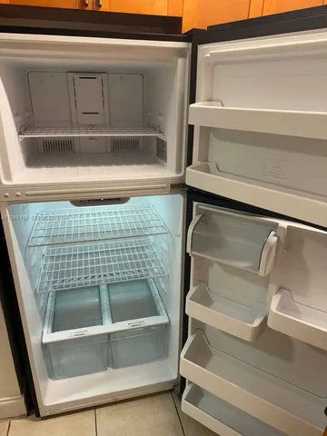 a bathroom with a sink a mirror and a window