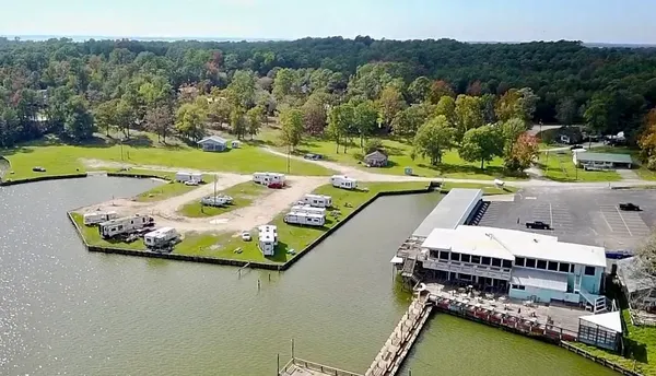 an aerial view of a house with a swimming pool