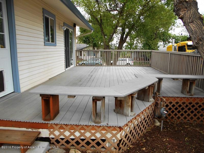 715 West 5th Street Rifle, CO 81650 - Photo 11 of 11 a view of backyard with a patio and outdoor seating