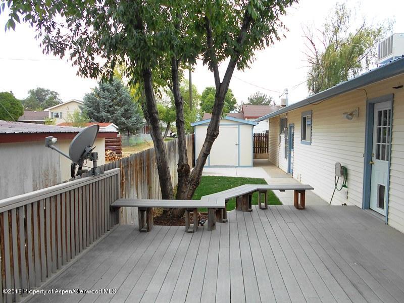 715 West 5th Street Rifle, CO 81650 - Photo 10 of 11 a view of a house with backyard and sitting area