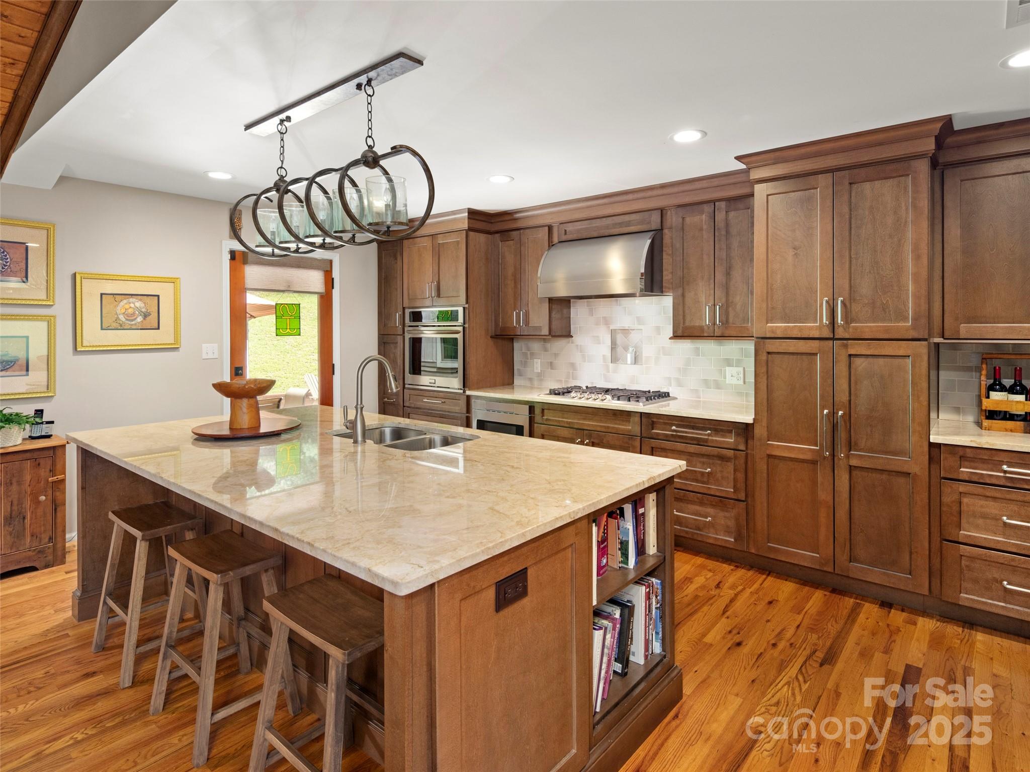298 Lone Pine Road Alexander, NC 28701 - Photo 12 of 48 a kitchen with a counter space a sink appliances and cabinets