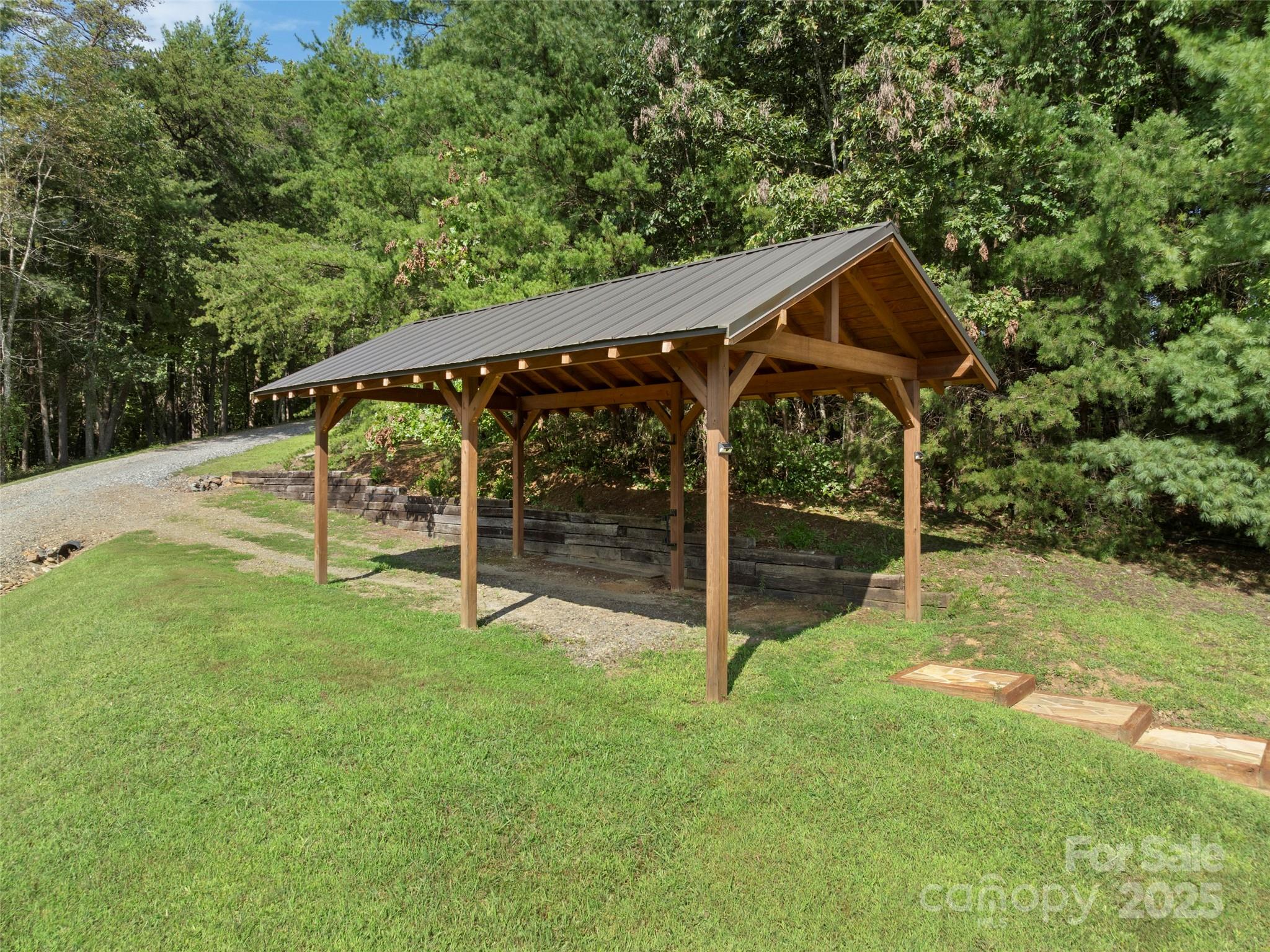 298 Lone Pine Road Alexander, NC 28701 - Photo 44 of 48 a view of backyard with small cabin