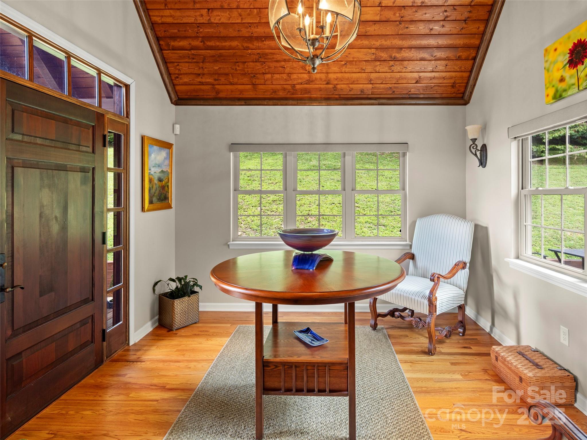 298 Lone Pine Road Alexander, NC 28701 - Photo 7 of 48 a view of a dining room with furniture and a window