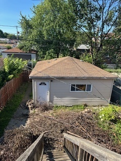 608 West 95th Street Chicago, IL 60628 - Photo 3 of 3 a backyard of a house with lots of green space