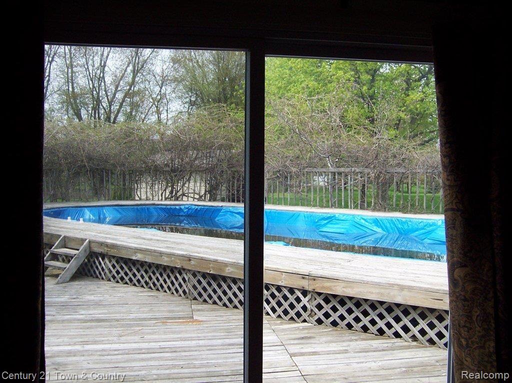 8710 Miller Road Clarkston, MI 48348 - Photo 5 of 17 View of pool from family room