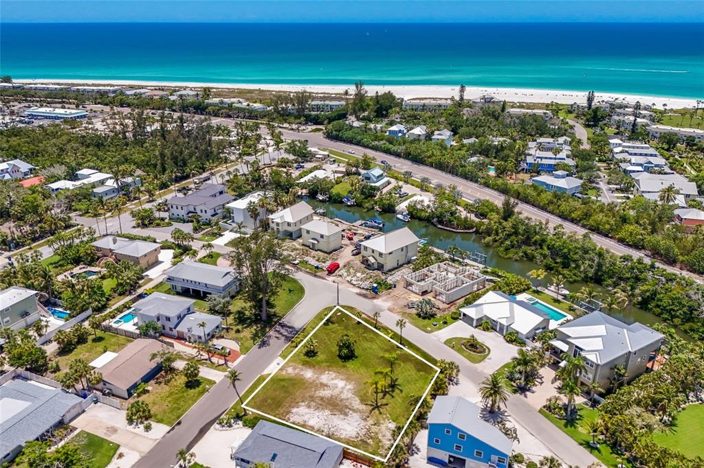 591 Russell Street Longboat Key, FL 34228 - Photo 2 of 19 an aerial view of residential houses with outdoor space