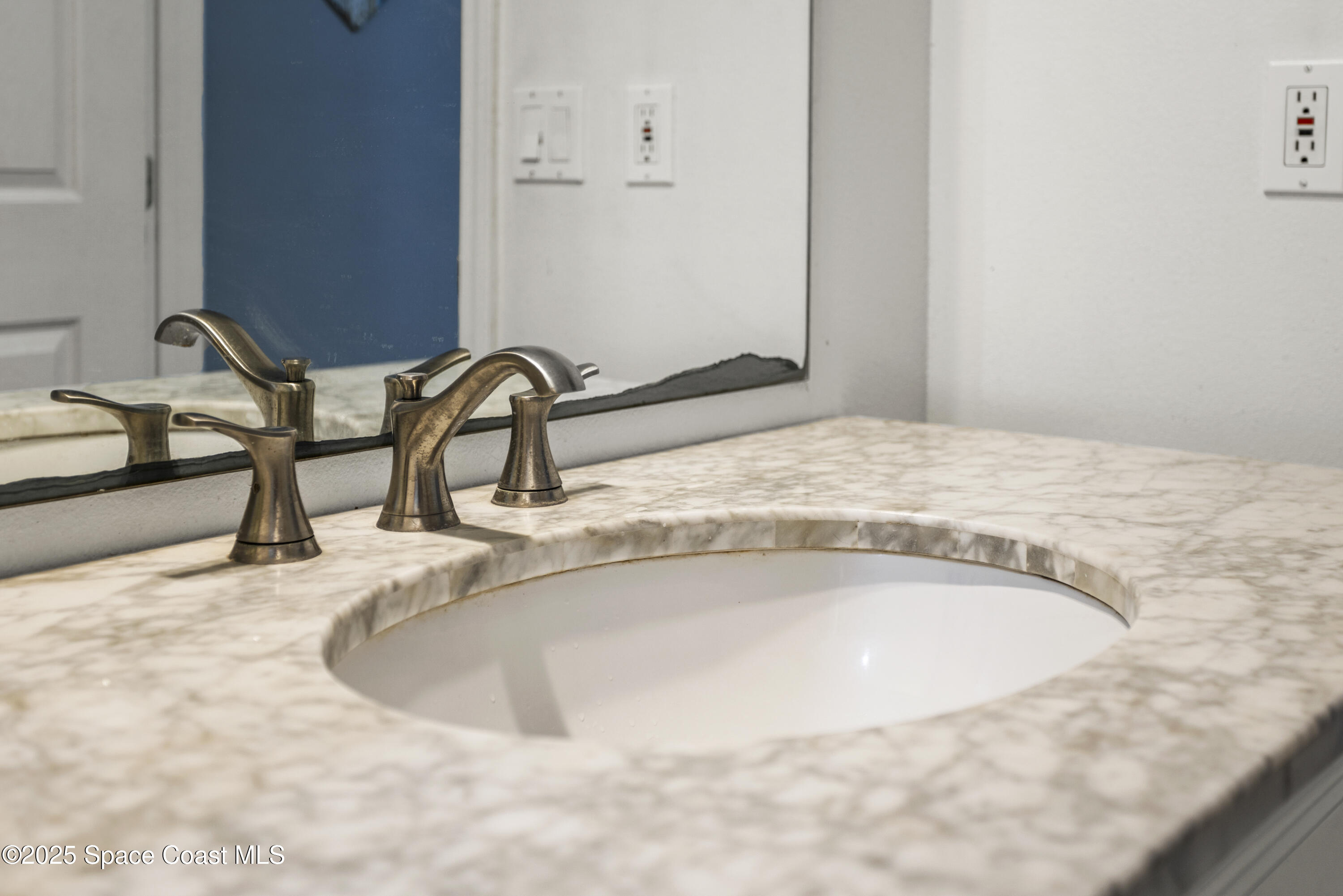 5964 Travis Street Mims, FL 32754 - Photo 11 of 45 a view of a sink and a faucet in the room