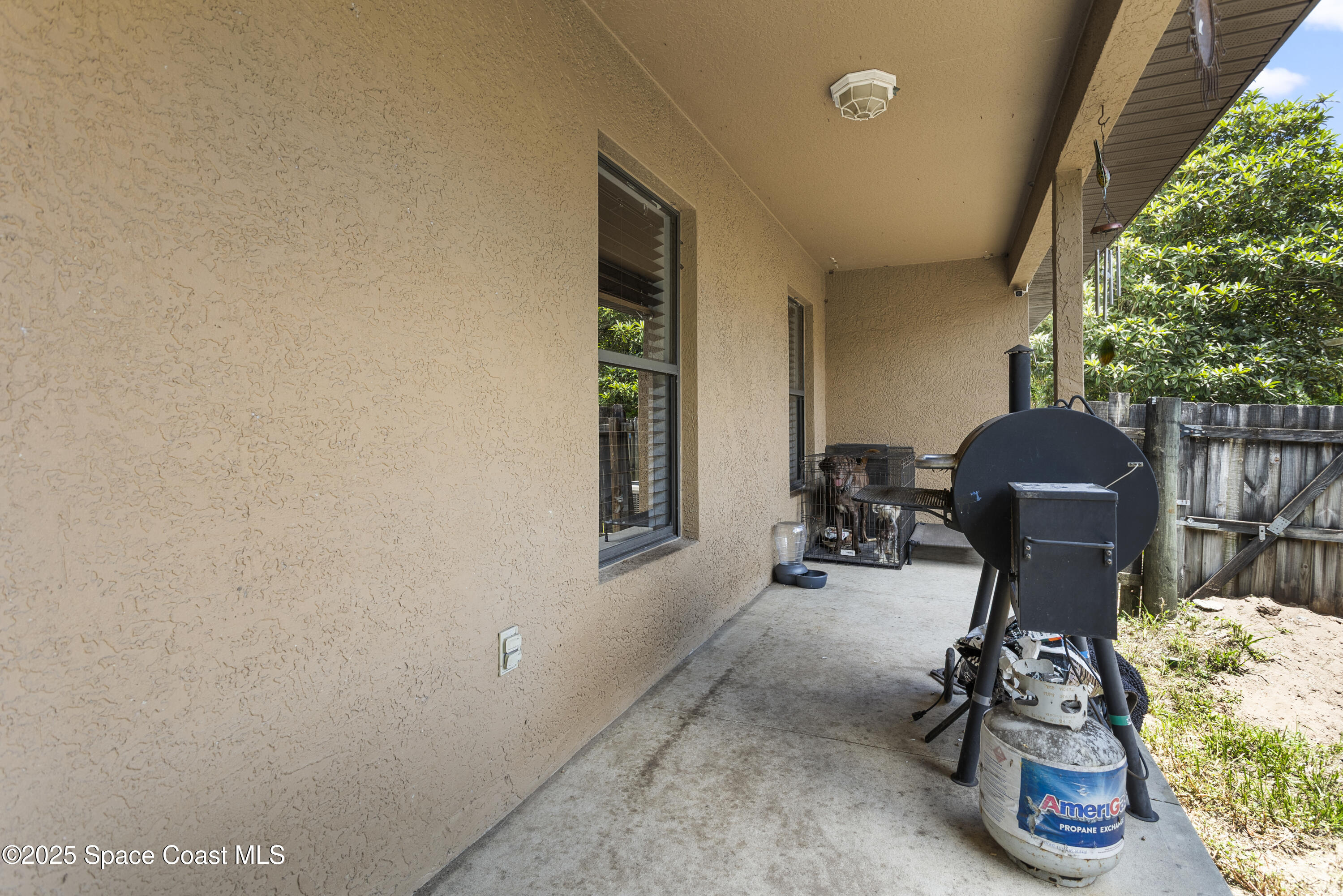 5964 Travis Street Mims, FL 32754 - Photo 44 of 45 a view of a room with gym equipment