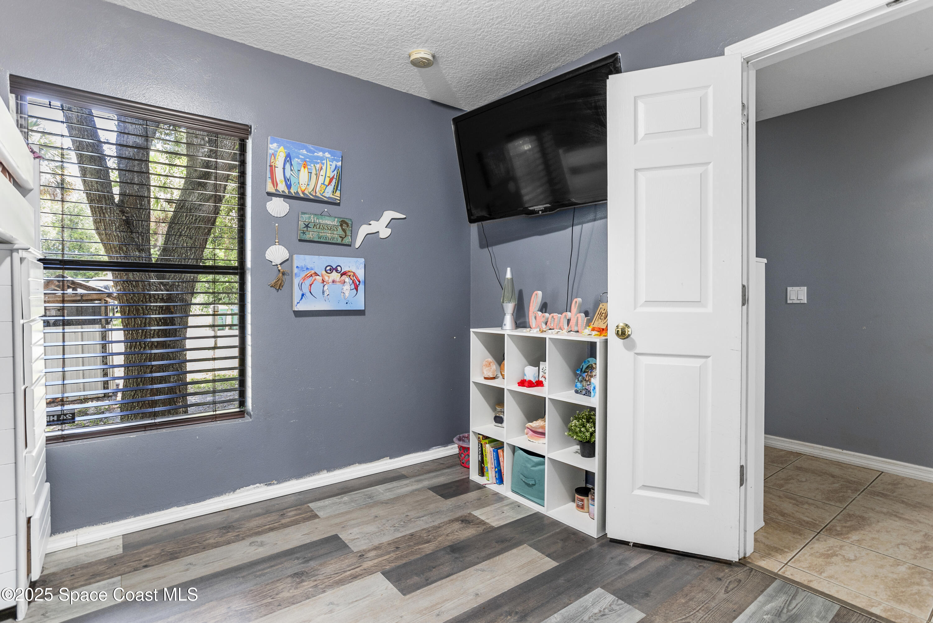 5964 Travis Street Mims, FL 32754 - Photo 8 of 45 a room with storage and utility