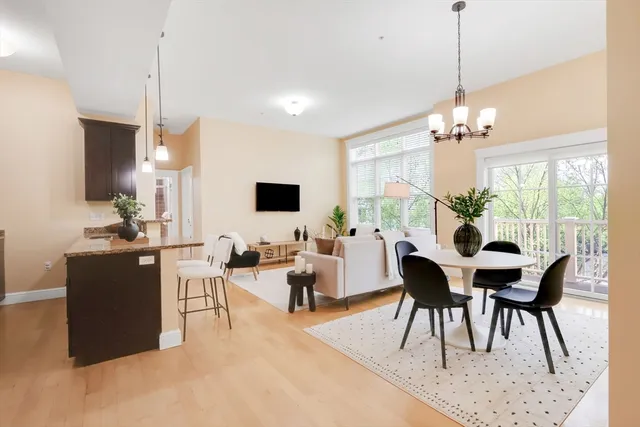 a view of a dining room with furniture window and outside view