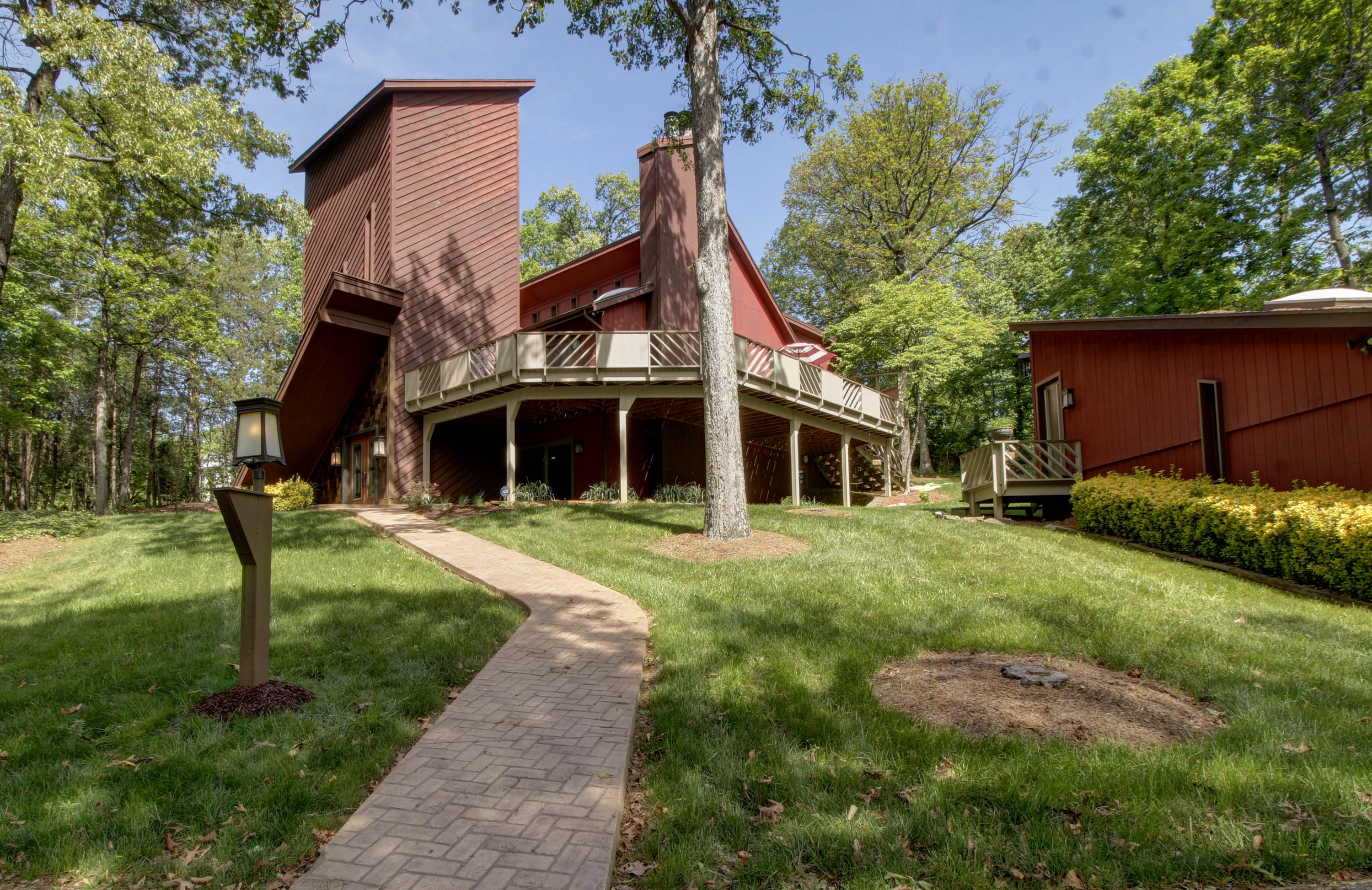 16 Stonehaven Lane Blue Ridge, VA 24064 - Photo 2 of 46 a front view of a house with a garden
