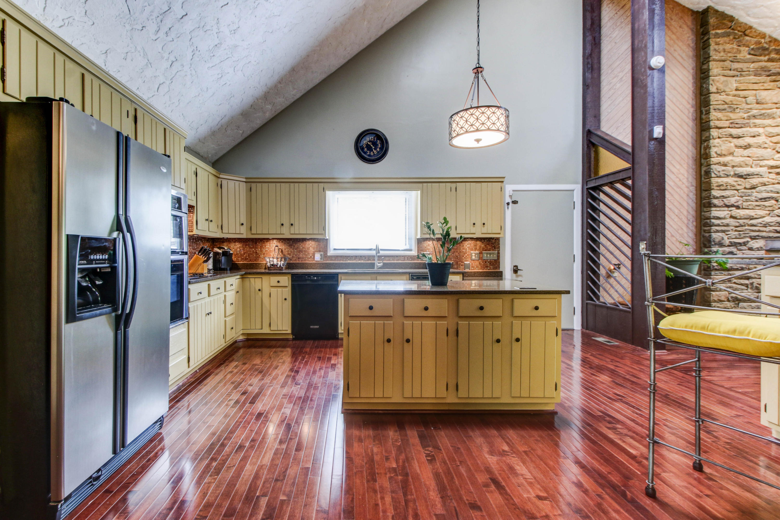 16 Stonehaven Lane Blue Ridge, VA 24064 - Photo 12 of 46 a kitchen with stainless steel appliances granite countertop a refrigerator a sink dishwasher a stove and white countertops with wooden floor