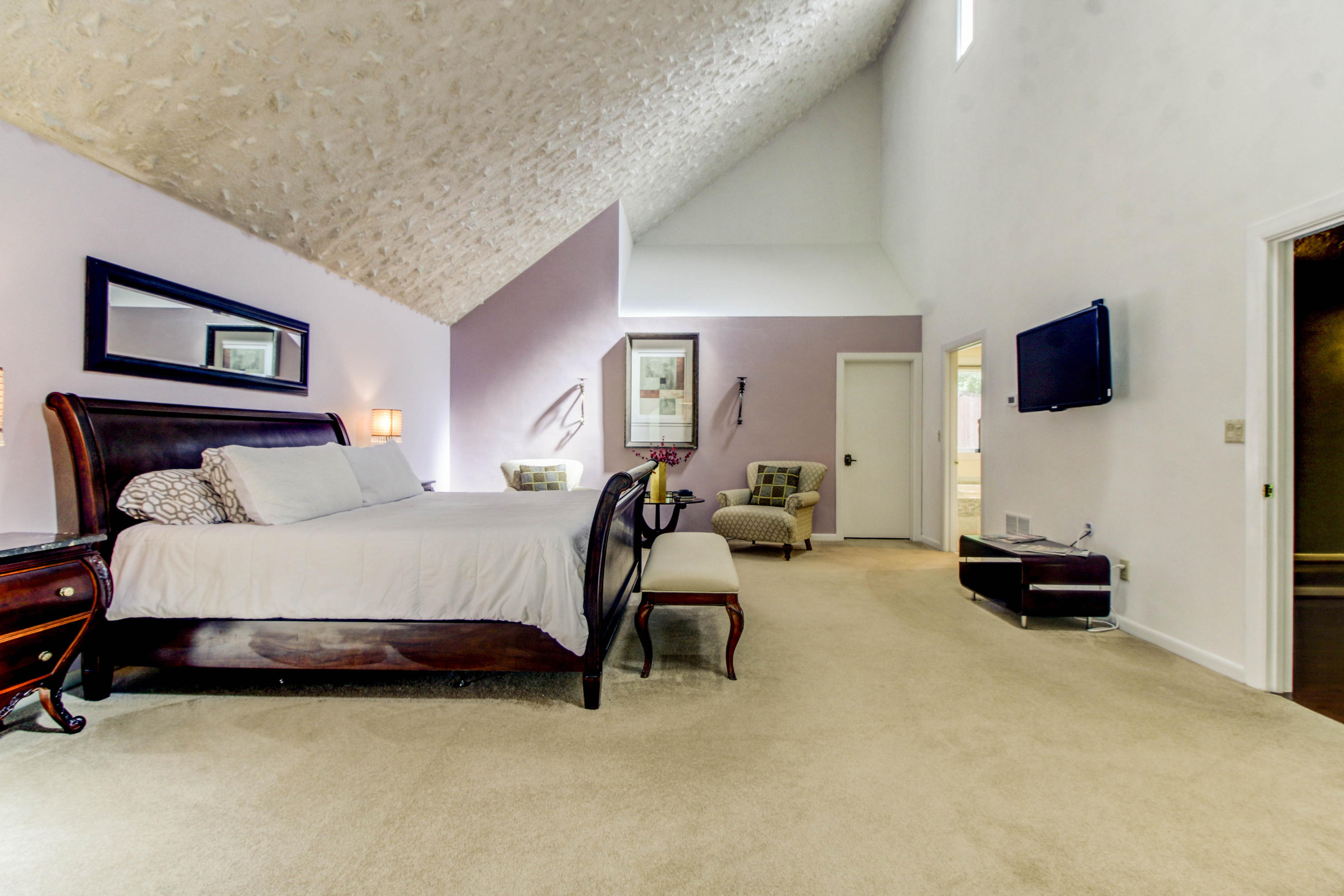 16 Stonehaven Lane Blue Ridge, VA 24064 - Photo 27 of 46 a bedroom with a bed and a chair