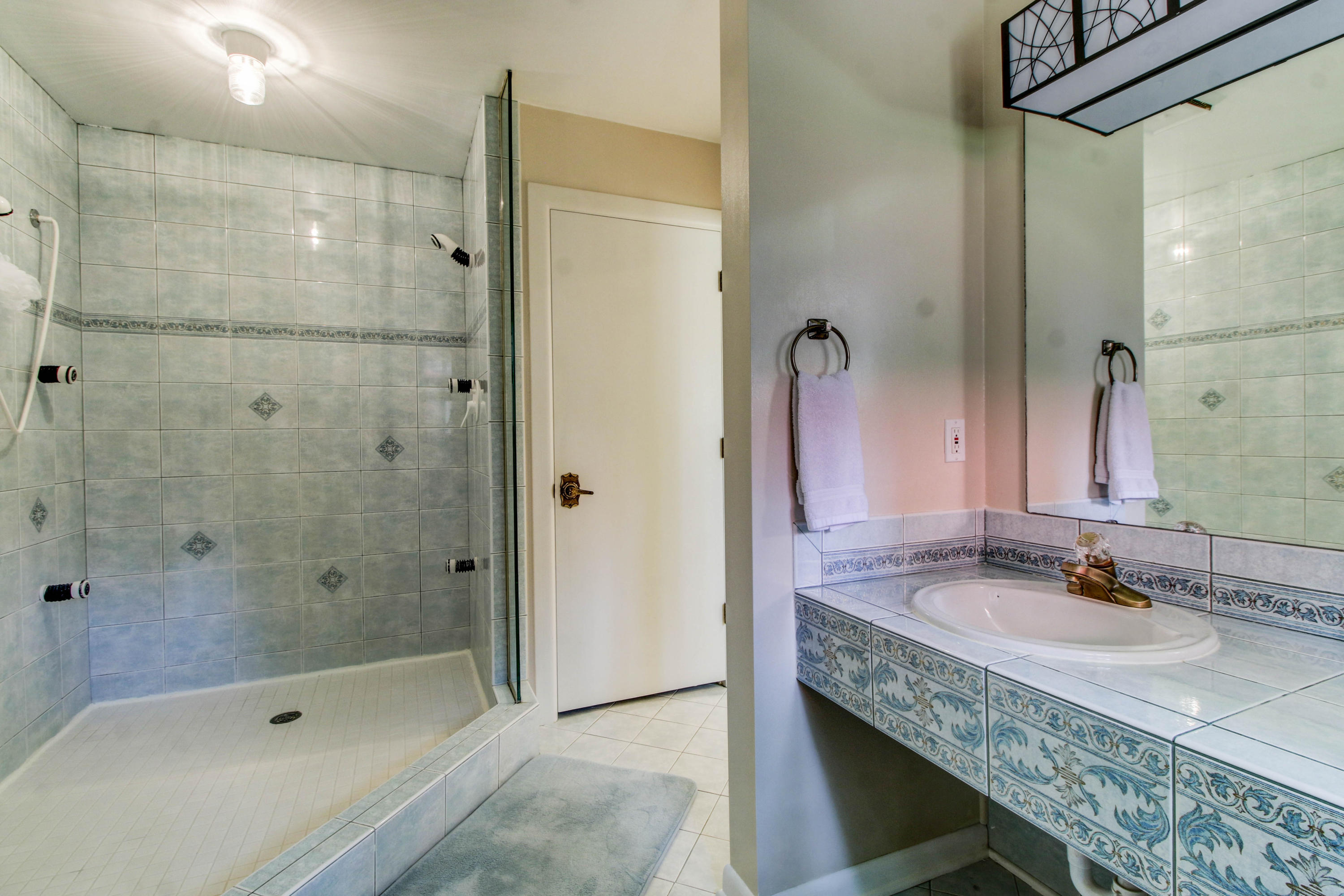 16 Stonehaven Lane Blue Ridge, VA 24064 - Photo 33 of 46 a bathroom with a granite countertop bathtub shower sink and mirror