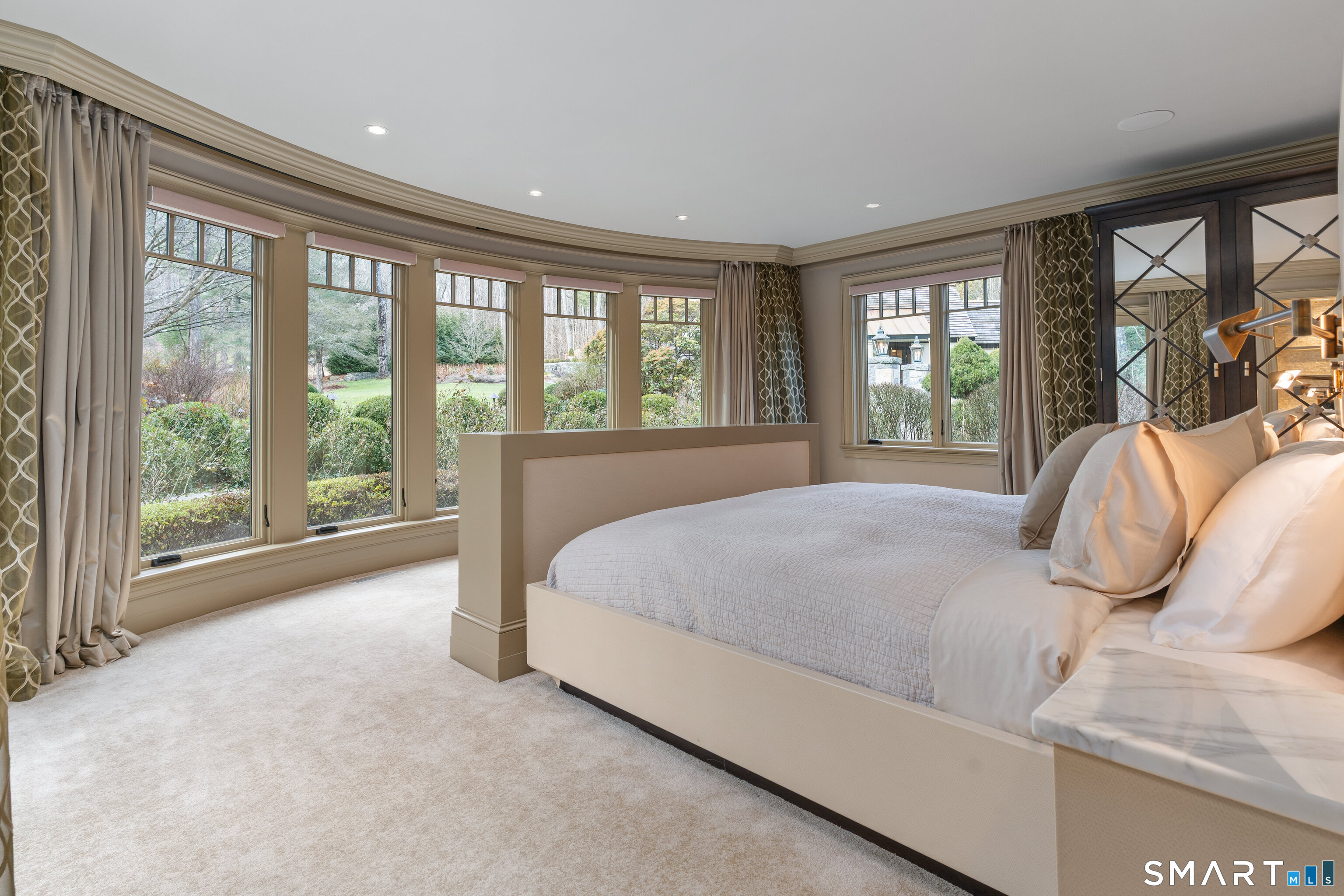 252 River Road Deep River, CT 06417 - Photo 16 of 40 a bed sitting in a bedroom next to a large window