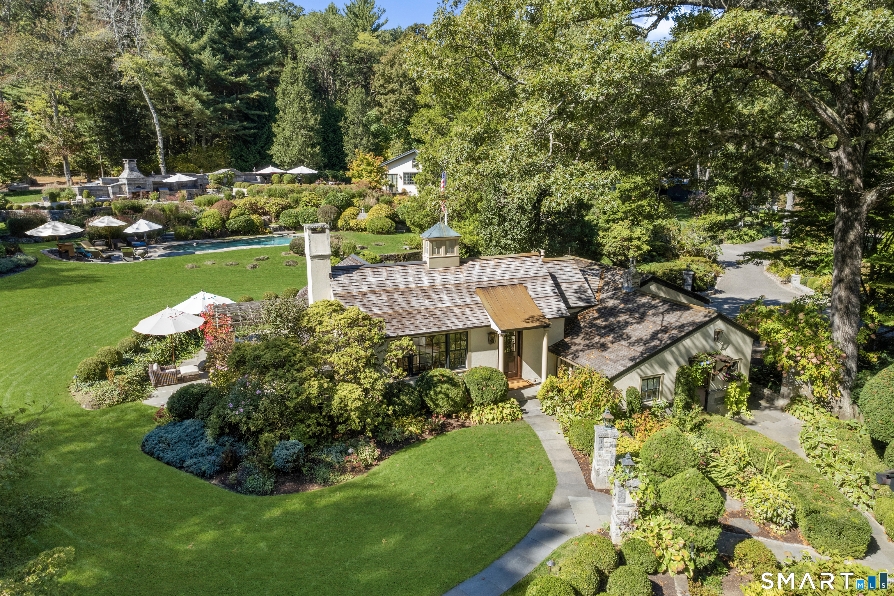 252 River Road Deep River, CT 06417 - Photo 22 of 40 a view of a garden with swimming pool